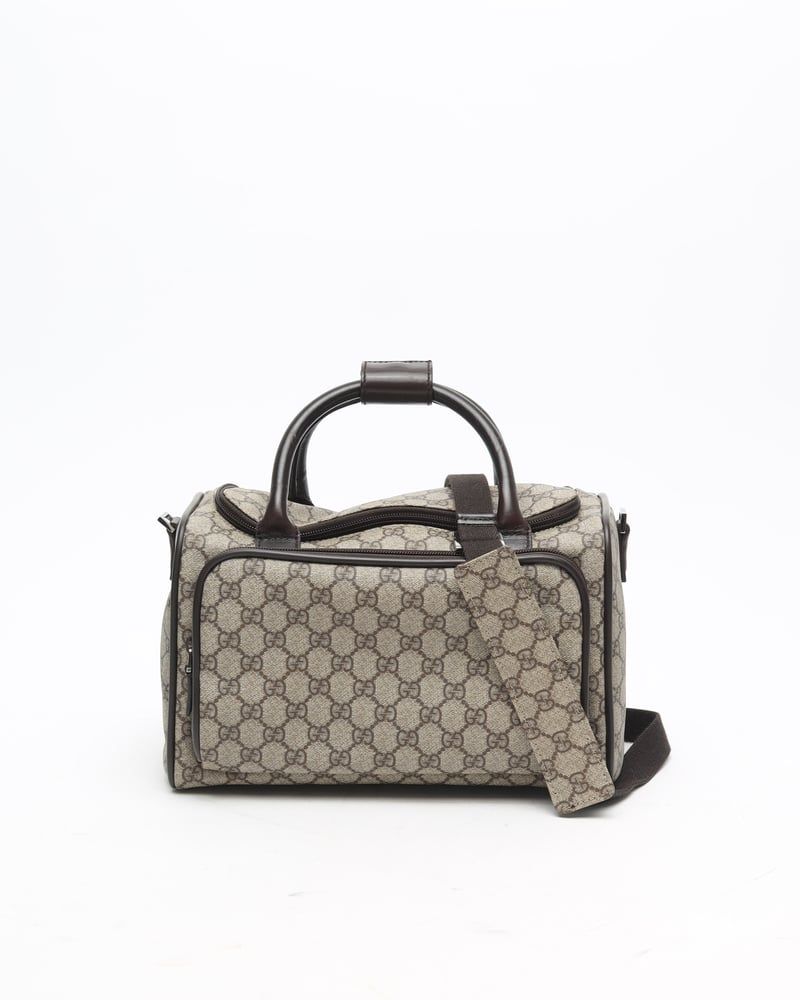 Gucci   |    Supreme Crossbody Bag