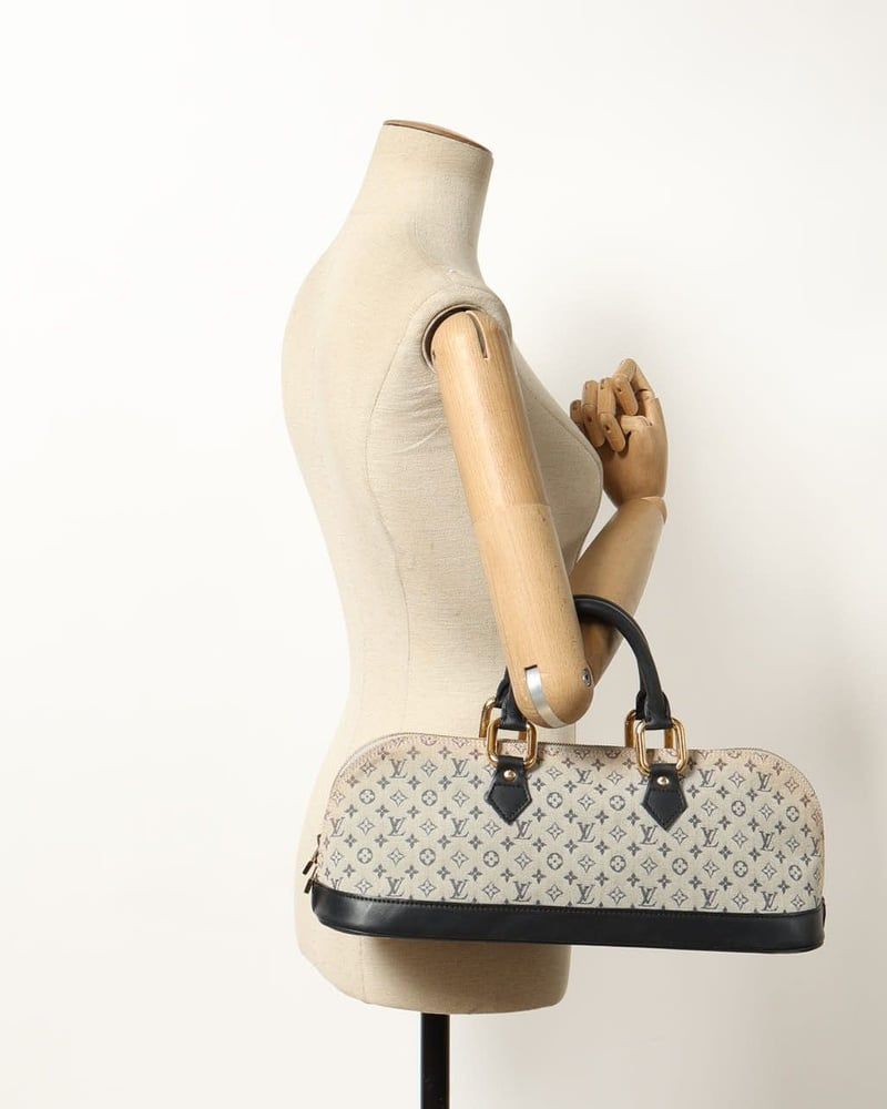 Louis Vuitton   |    Alma Long, Monogram Mini Lin