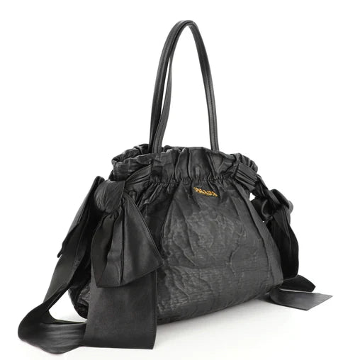 Prada   |    Bow Tie Pleated Handbag