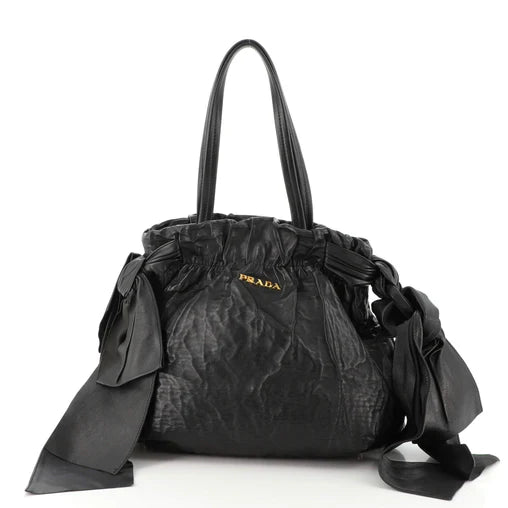 Prada   |    Bow Tie Pleated Handbag