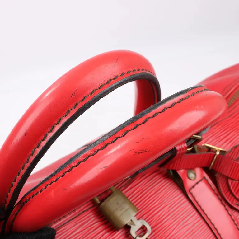 Louis Vuitton   |    Epi Keepall 55 Castillan Red Travel Bag