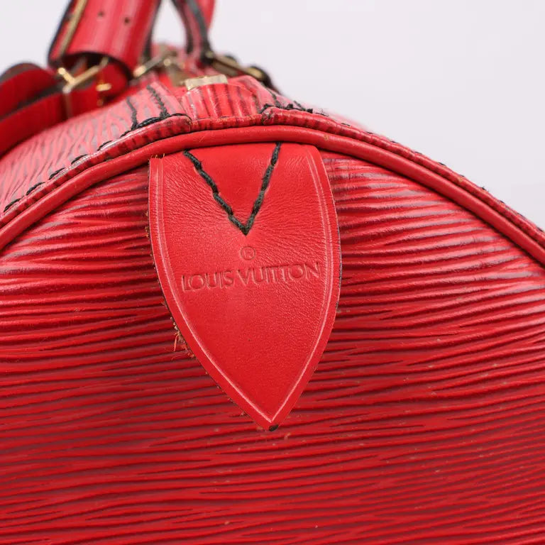 Louis Vuitton   |    Epi Keepall 55 Castillan Red Travel Bag